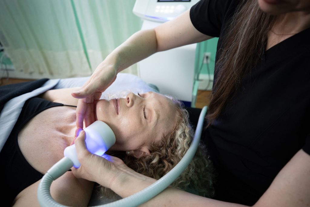 A person undergoing a cryofacial treatment, experiencing the rejuvenating effects of cryotherapy on their skin.