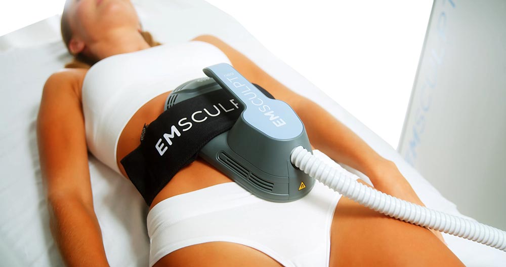 Emsculpt Neo device in a clinic setting, showcasing advanced body sculpting technology.