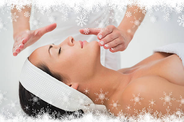 A person receiving a Fire and Ice facial treatment, with alternating warm and cool sensations on their face.